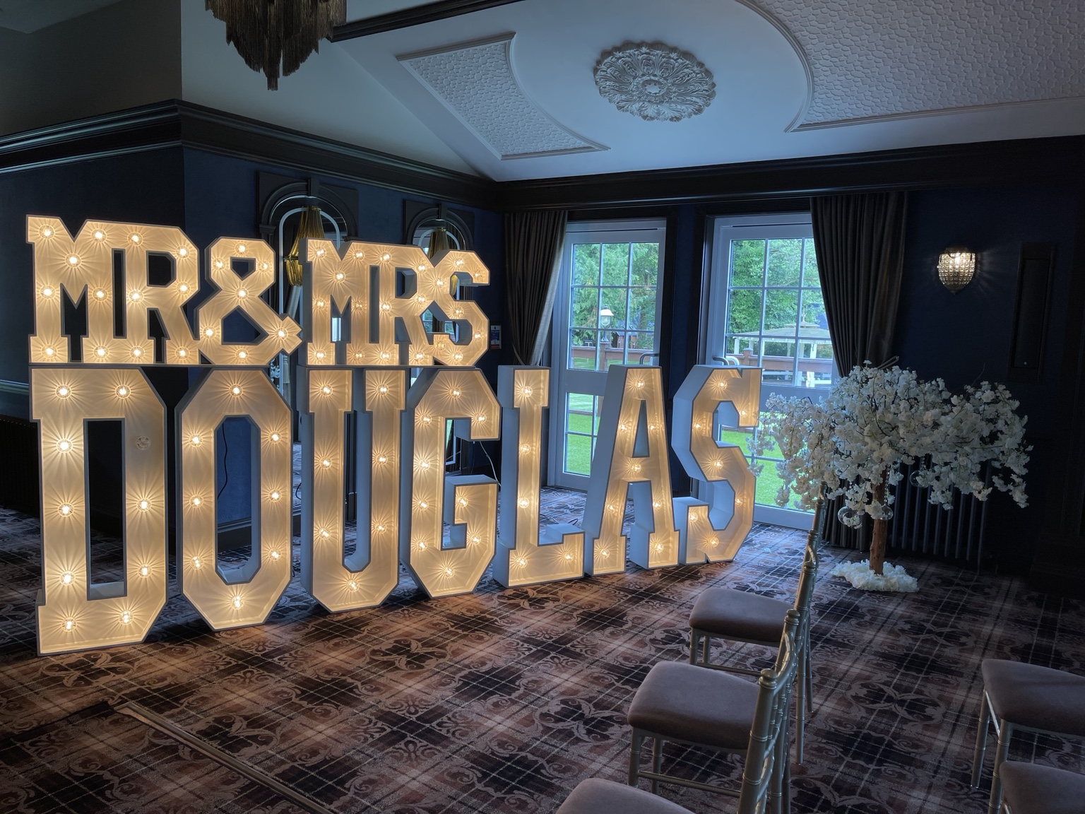 White LED dance floor with large surname letters